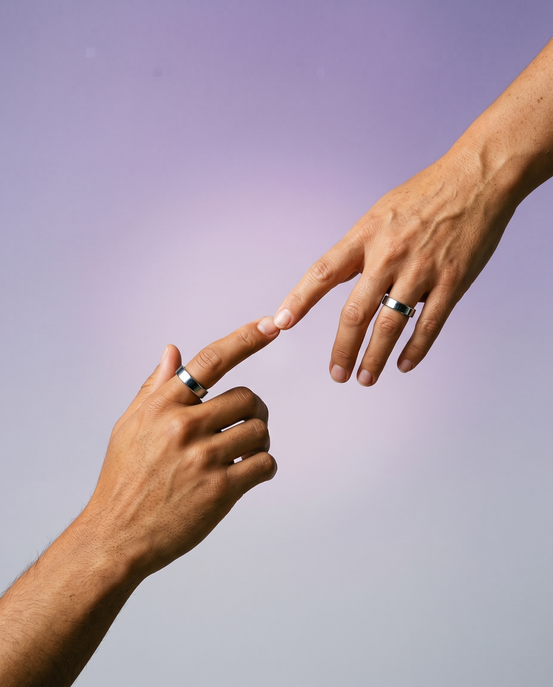 Two hands with smart rings touching each other against a gradient purple and gray background